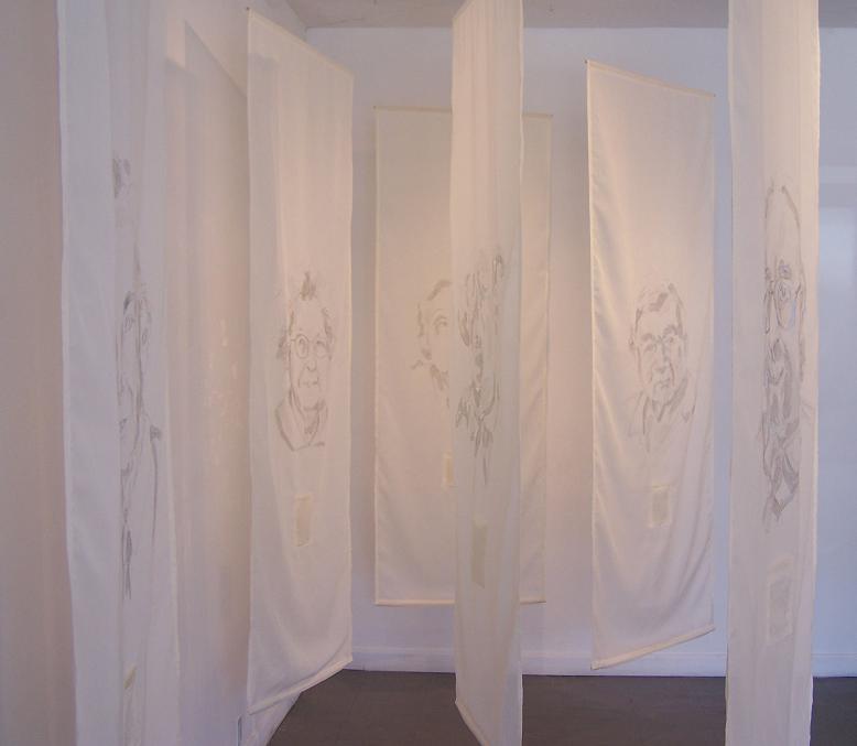 Re-visible; Loop Gallery; Graphite & ink on fabric, burnt sections, paper; Each panel 84"h x 30"w; 2006